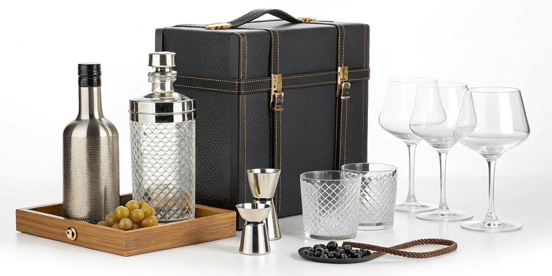 A luxury gin gift set featuring a cocktail shaker, glasses, and bar tools in an elegant case.