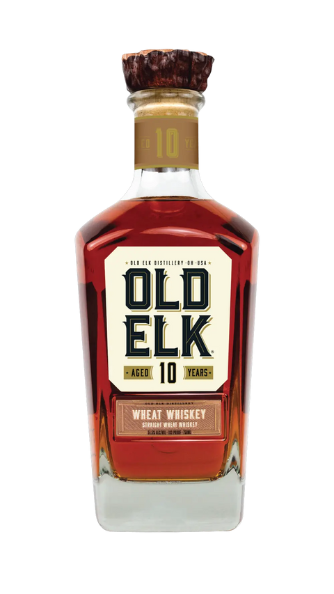 A bottle of Old Elk 10 Year Straight Wheat Whiskey (Pre-Order) from Old Elk Bourbon, a premium American whiskey aged for 10 years, featuring a gold label, wooden cap, and distinctive wide-shouldered bottle with rich amber liquid.