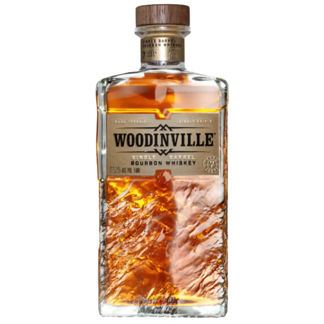 A rectangular bottle of Woodinville Whiskey Single Barrel Bourbon Whiskey Aged 7 Years 700mL features a wooden cap, amber liquid, and a beige label with the Woodinville brand name and product details.