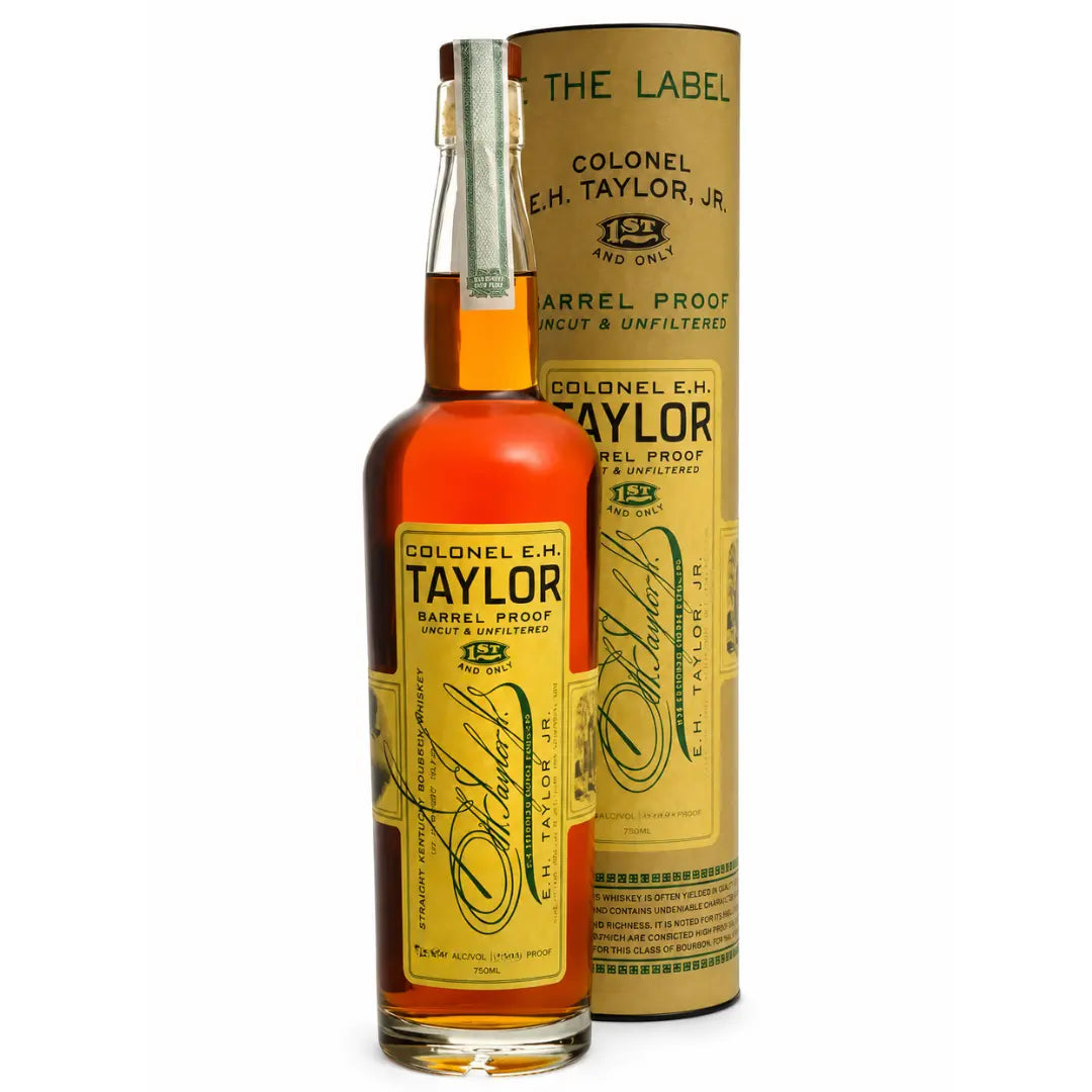 A bottle of Colonel E.H. Taylor, Jr. Barrel Proof bourbon stands in front of its signature cylindrical yellow box packaging, both featuring vintage-inspired labels adorned with black text and gold accents from the Colonel E.H. Taylor brand. This outstanding Kentucky straight bourbon whiskey showcases a bold character that is perfectly embodied in its barrel proof presentation.