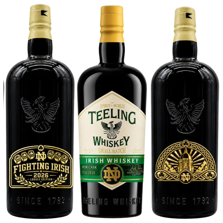 The Teeling x Notre Dame 2026 Custom Deep Etched Irish Whiskey Heritage Bundle by Teeling Whiskey features three black bottles adorned with gold and green Notre Dame-themed labels. Showcasing the Fighting Irish, a cathedral design, and the Teeling logo, this collector’s set highlights Notre Dame Irish whiskey heritage—with each bottle displaying “SINCE 1782” at the bottom.