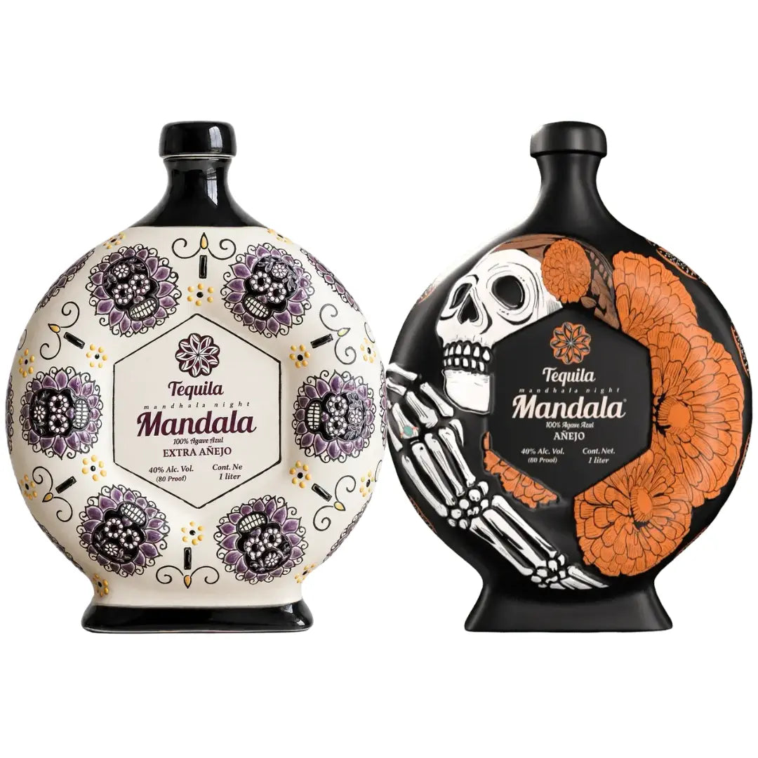 Mandala Día de los Muertos 2025 &amp; 2026 Limited Edition Tequila Bundle featuring two round, flat-bottomed bottles: one white with purple floral skull motifs and one black with a skeleton and orange marigolds.