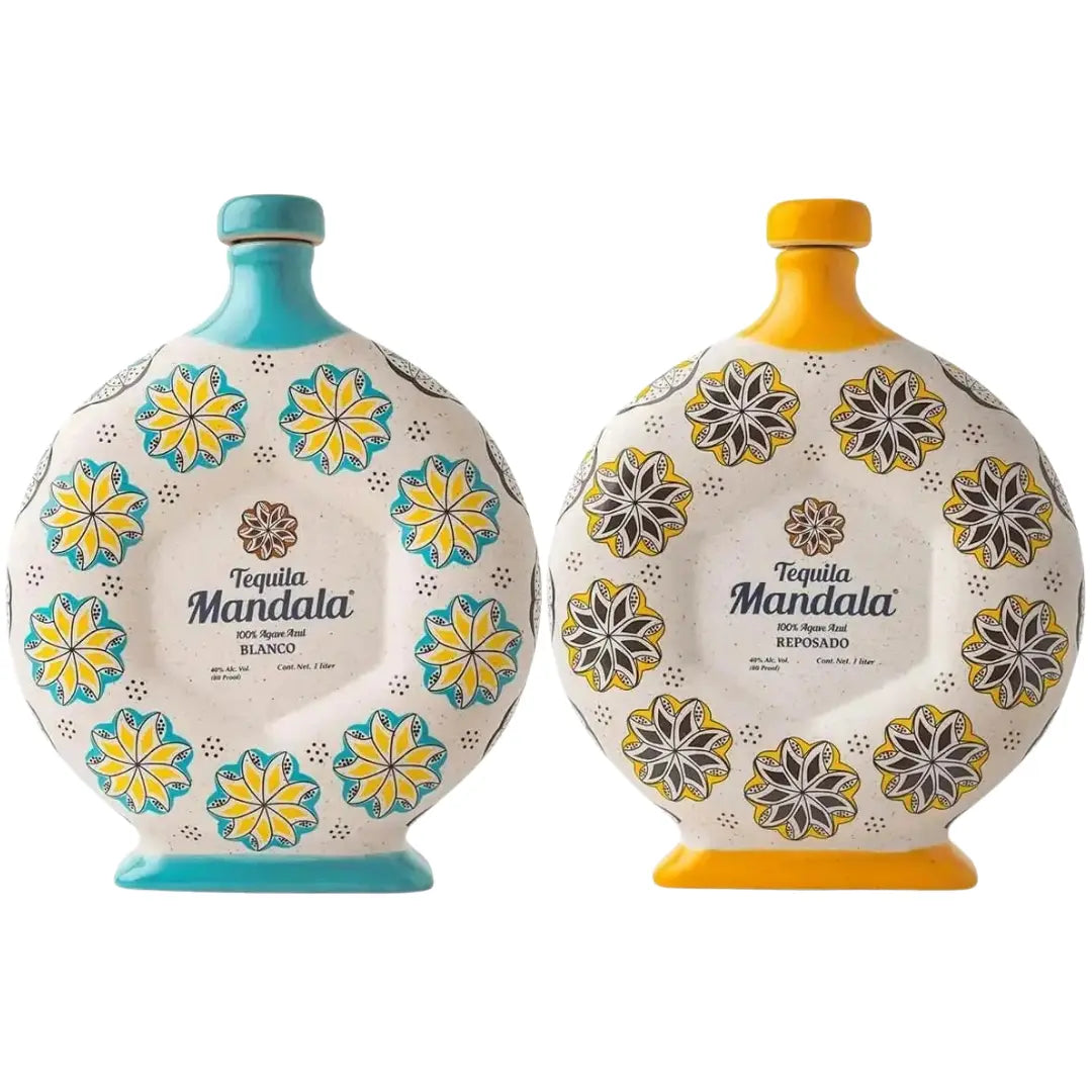 Two round, hand-painted Mandala Blanco &amp; Reposado Tequila bottles decorated with floral patterns, one with turquoise accents and one with yellow accents.