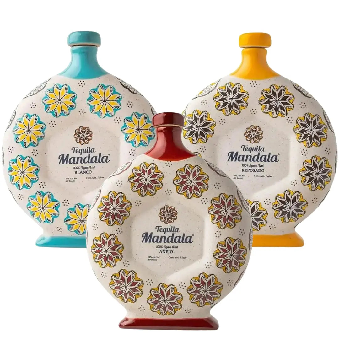Three round, decorative Mandala Blanco, Reposado & Añejo Tequila bottles featuring floral mandala patterns, with stoppers in teal, yellow, and red.