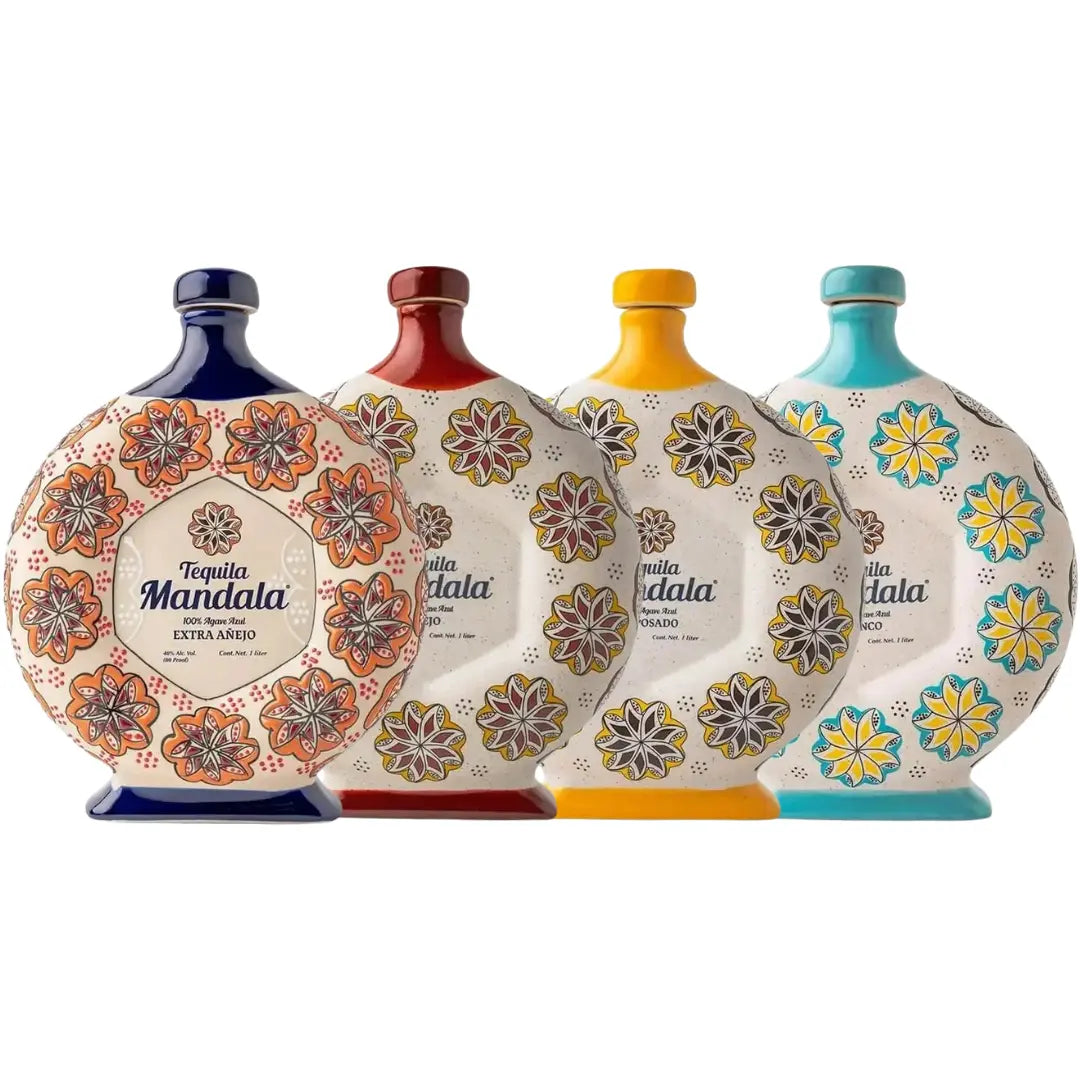 Four circular, decorative Mandala Blanco, Reposado, Añejo &amp; Extra Añejo Tequila Bundle bottles with colorful floral patterns, arranged in a row from left to right with blue, red, yellow, and turquoise accents.