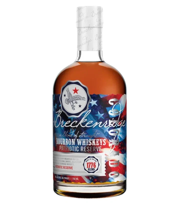 A bottle of Breckenridge Patriotic Reserve Bourbon Whiskey from Breckenridge Distillery, showcasing a red, white, and blue American flag-themed label with a white cap and patriotic imagery. This high-rye bourbon truly captures the spirit of American whiskey, making it an exceptional choice for enthusiasts and collectors.