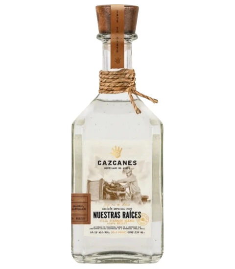 Cazcanes Nuestras Raíces Still Strength Blanco Tequila 2026 by Cazcanes Tequila features a clear glass bottle with wooden cork and vintage-style label, twine-wrapped neck, and is crafted as a limited-edition collector’s piece.