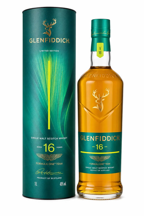A green bottle of Glenfiddich 16 Year Aston Martin Formula One Edition Release 2 Single Malt Scotch Whisky (Pre-Order) is displayed next to its matching cylindrical box, both adorned with gold and teal accents and the signature stag logo, echoing the sleek style associated with Aston Martin.