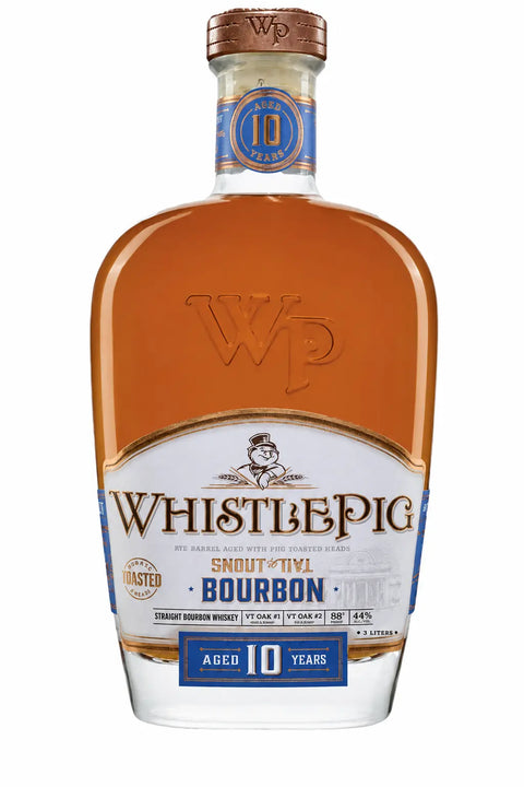 A large-format 3L bottle of WhistlePig Snout to Tail 10 Year Toasted Bourbon is presented in clear glass, featuring a cork stopper and blue and gold labeling that prominently displays the WhistlePig brand and age details.
