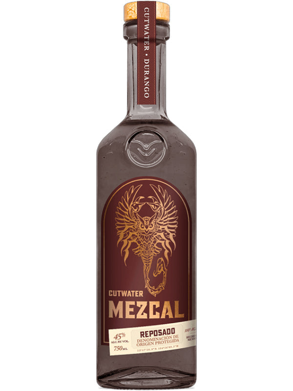 A bottle of Cutwater Spirits’ Cutwater Reposado Mezcal features a brown label with agave and serpent art, clear glass, and a cork top labeled “Cutwater Durango”—crafted from 100% agave in the Oaxacan mezcal tradition.