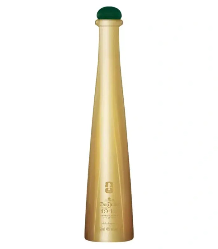 A tall, sleek metallic gold Don Julio 1942 FIFA World Cup 2026 Limited Edition 50mL bottle with a green cap and minimal front text stands upright against a white background.