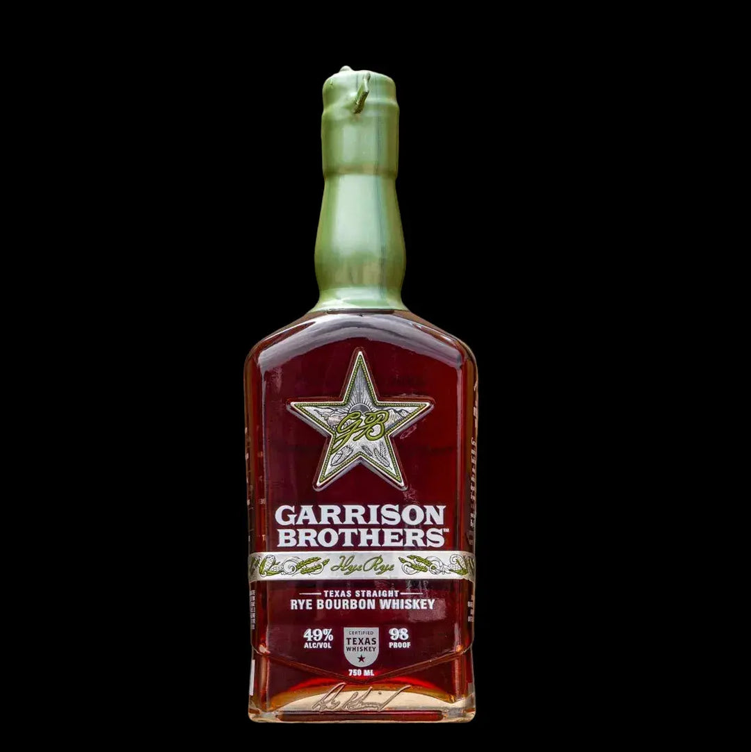 A bottle of Garrison Brothers Hye Rye Bourbon Whiskey 2026, a limited release Texas straight rye bourbon from Garrison Brothers, featuring a gold wax seal and a star logo on the front, is displayed against a black background.