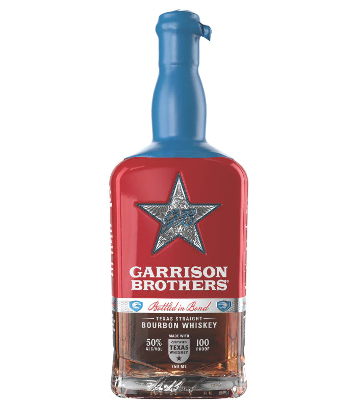 A bottle of Garrison Brothers Bottled in Bond Texas Straight Bourbon Whiskey with a blue wax seal, red label with a silver star, and white text showing 50% ABV (100 proof), from the Garrison Brothers brand.