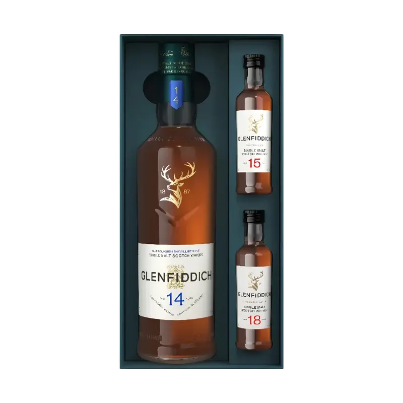 A Glenfiddich 14 Year Single Malt Scotch Whisky Limited Edition Gift Set with 15 & 18 Year 50mL containing one full-sized bottle and two miniature bottles of scotch whisky.