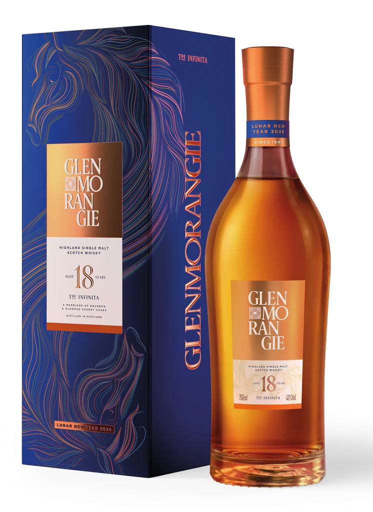 A bottle of Glenmorangie 18 Year Old Infinita Lunar New Year 2026 Limited Edition Single Malt Scotch stands next to its blue box, featuring an elegant golden horse and orange accents—a festive exclusive from Glenmorangie.