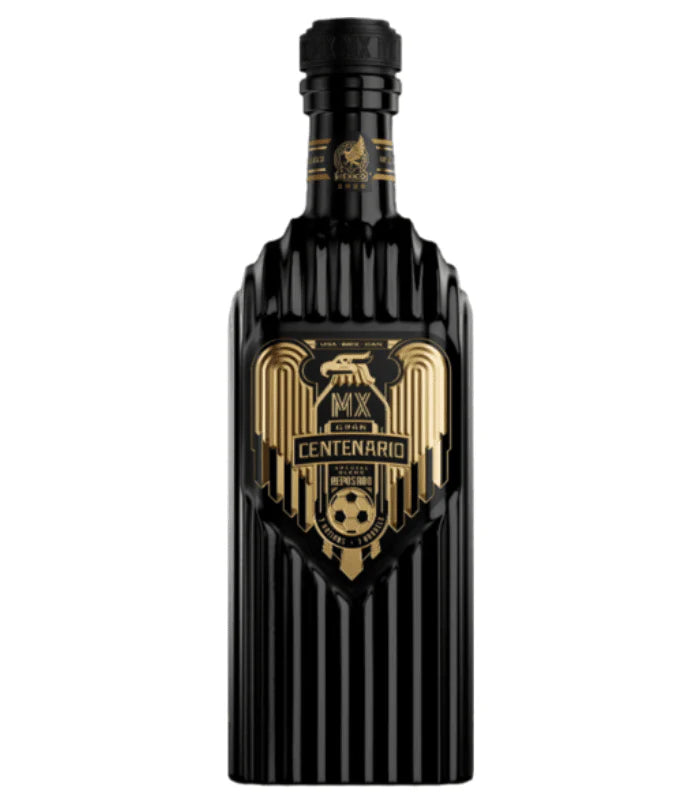 Celebrate 100 years of Mexican soccer with Gran Centenario World Cup MX Special Blend Reposado Tequila. This sleek black bottle with gold accents, eagle and soccer ball motifs, and "Centenario" is a must-have collectible for tequila fans.