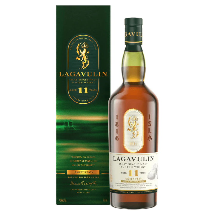 A bottle of Lagavulin 11 Year Old Sweet Peat Islay Single Malt Scotch Whisky 750ml stands before its green and gold box, both displaying the Lagavulin logo and product details, highlighting this limited edition release.