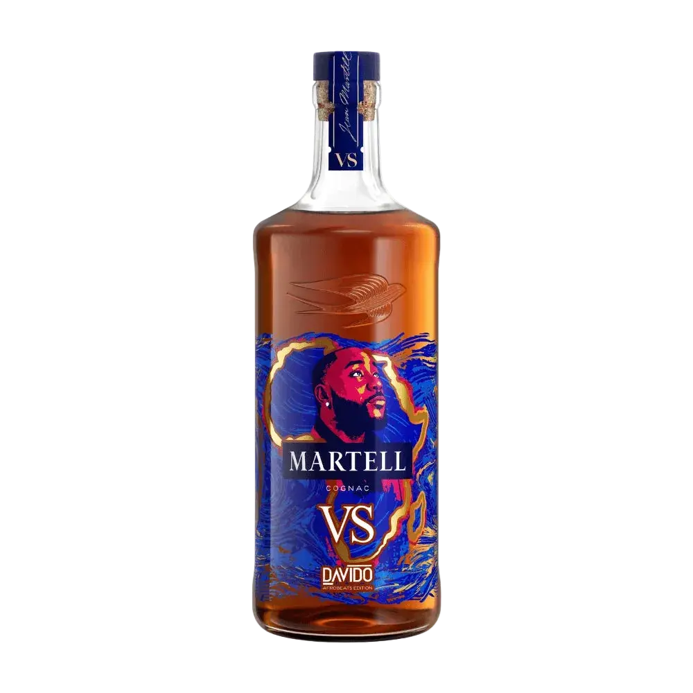 A limited edition Martell VS x Davido Afrobeats Limited Edition Cognac bottle featuring a label with an illustration of a man and vibrant blue, red, and gold abstract patterns.