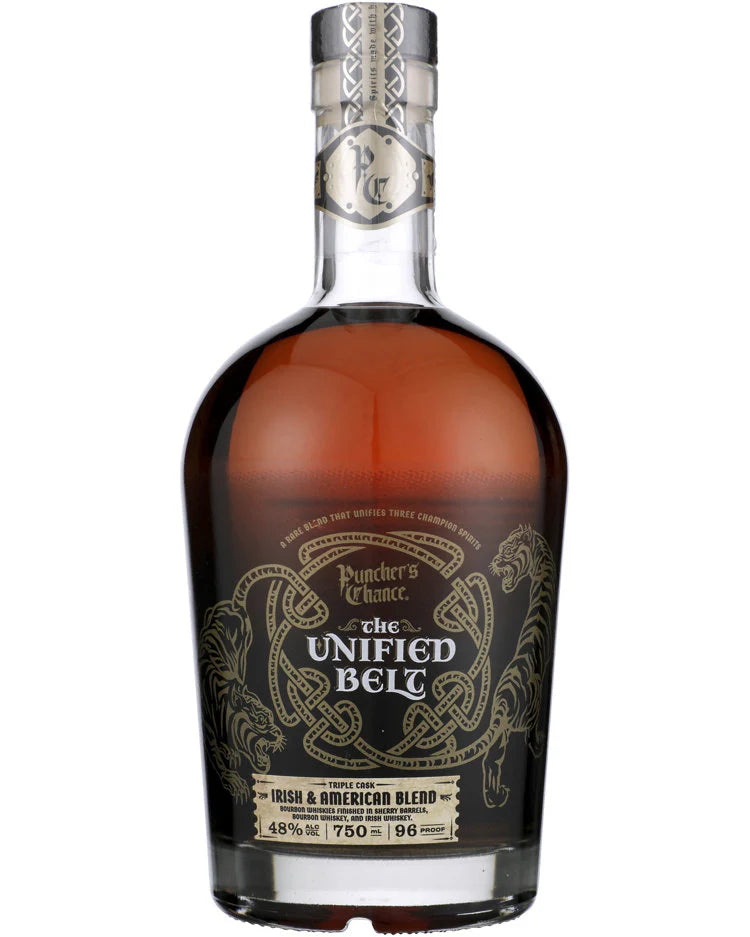 A bottle of Puncher’s Chance The United Belt Irish & American Blend whiskey, featuring ornate gold and black labels with two tigers facing each other and a silver neck wrap—crafted from Kentucky Straight Bourbon and Irish Single Malt.