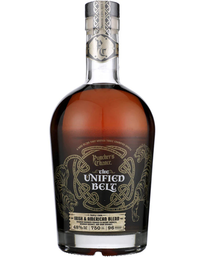 A bottle of Puncher’s Chance The United Belt Irish & American Blend whiskey, featuring ornate gold and black labels with two tigers facing each other and a silver neck wrap—crafted from Kentucky Straight Bourbon and Irish Single Malt.