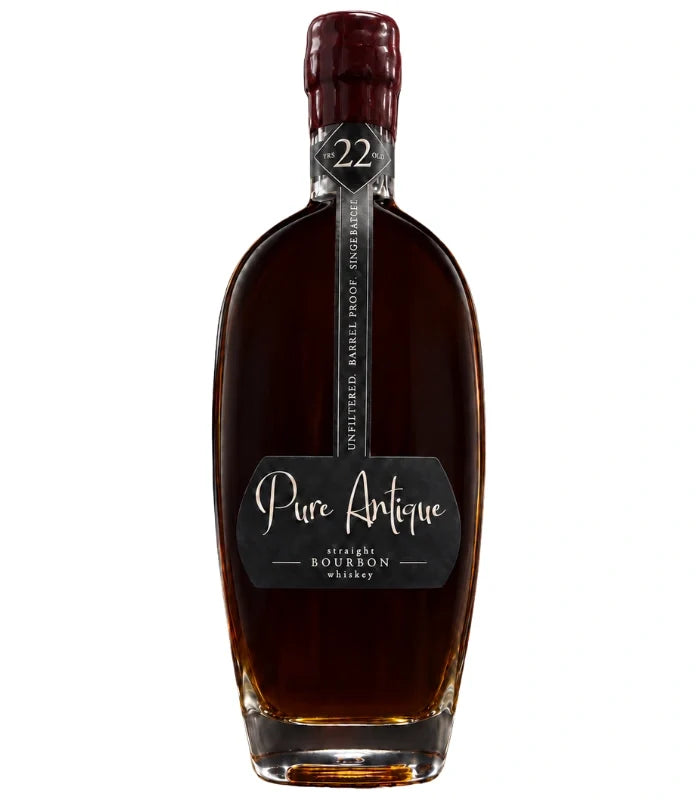 A dark brown bottle of Pure Antique 22 Year Old Straight Bourbon Whiskey, single barrel with a wax-sealed top and a label reading Unfiltered Barrel Proof Small Batch No. 22 from Pure Antique.