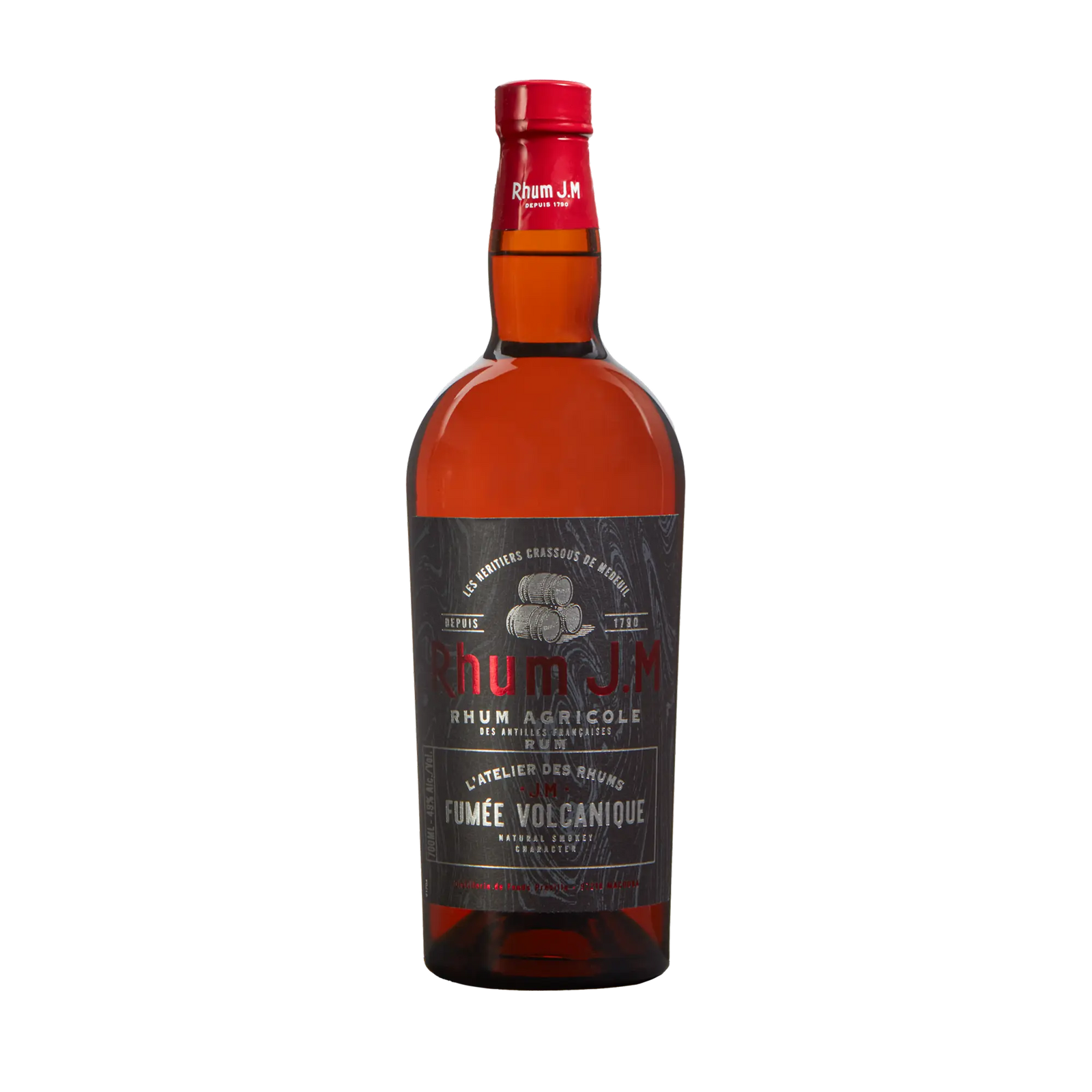 A tall bottle of Rhum J.M Atelier Fumée Volcanique rum with a red cap and dark label featuring silver and red text, crafted in bourbon barrels by Rhum J.M for an exceptionally smooth finish.