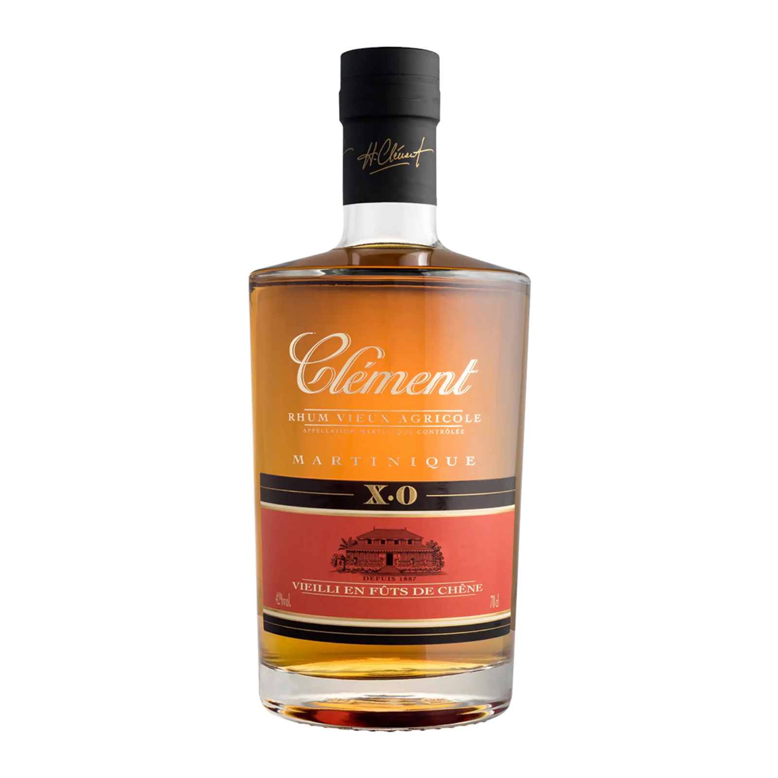 A bottle of Rhum Clément X.O. Vieux Rhum Agricole by Rhum Clément features a red and gold design, black cap, and a small distillery illustration on the front label.