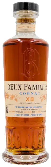 A glass bottle of Deux Familles XO Cognac with an amber hue and a cream-colored label detailing the 10-cask batch selection and origin.