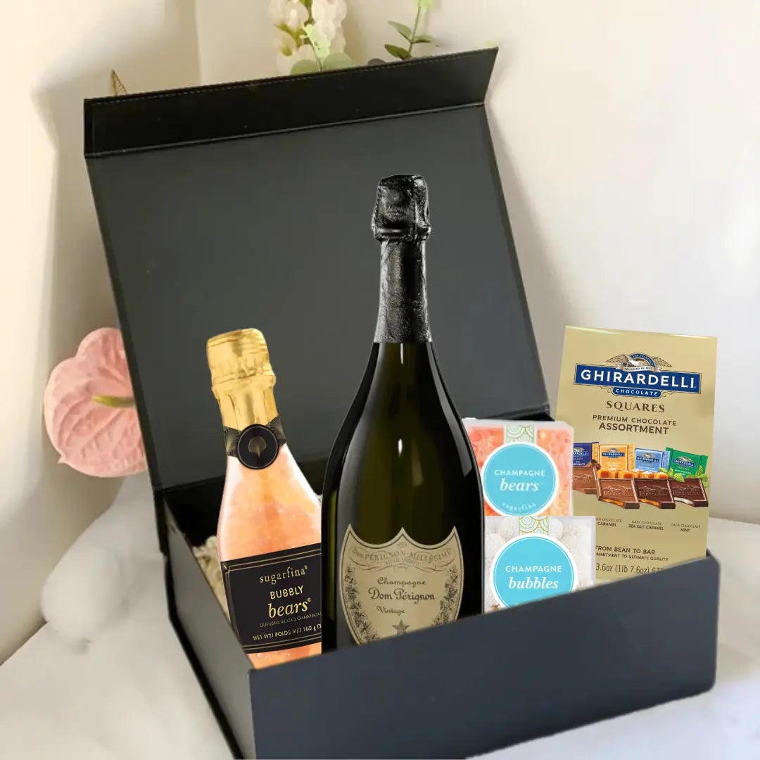 The Premium Champagne Gift Box by Main Street Liquor includes champagne, champagne gummy bears, bath bubbles, and Ghirardelli chocolates—an elegant choice for luxury Champagne gifts.