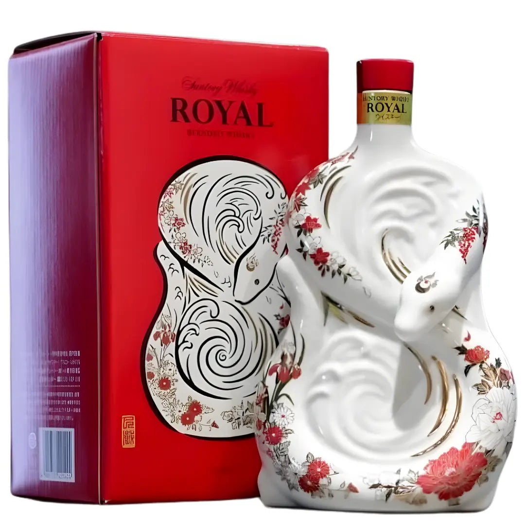 The Suntory Royal Whisky Year of The Snake 2025 Limited Edition Ceramic Bottle (600mL) features two intertwined white snakes with red and gold floral accents, next to a matching red box, all under the Suntory brand.