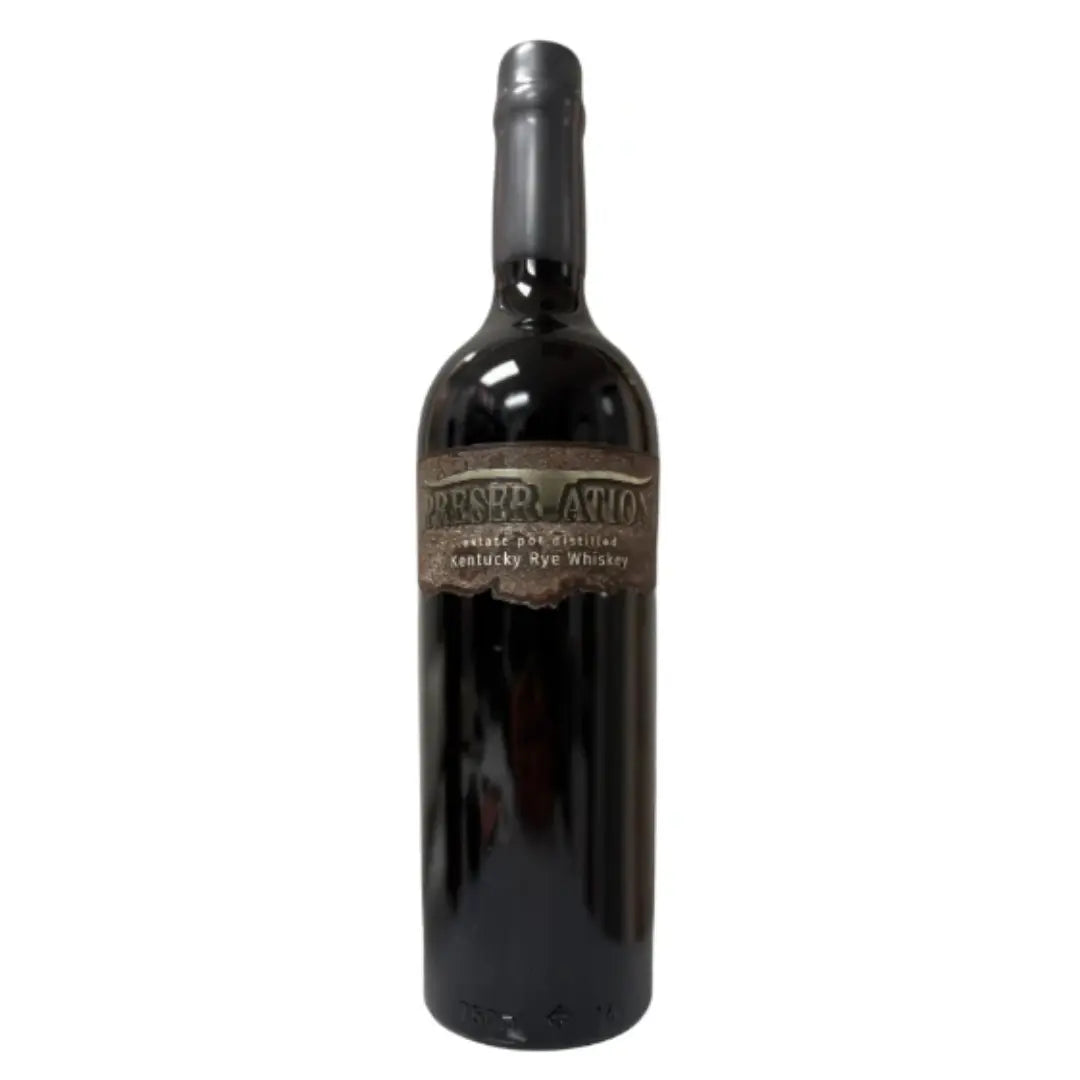 A 750mL dark glass bottle of Preservation Estate Pot Distilled Kentucky Rye Whiskey stands upright, featuring a wax-sealed top and rustic brown label by Preservation, set against a plain white background.