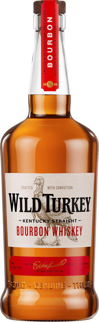 A bottle of Wild Turkey Bourbon 81 Proof features a red and gold label with a turkey illustration and bold black lettering, highlighting its expert aging in American White Oak barrels.