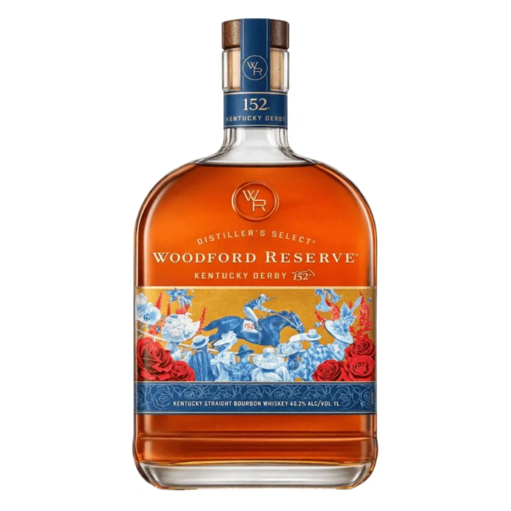 The Woodford Reserve Kentucky Derby 152 Edition 1L (PRE-ORDER) is a limited release with a decorative label featuring blue and white horses, jockeys, red roses, and gold lettering on the front.