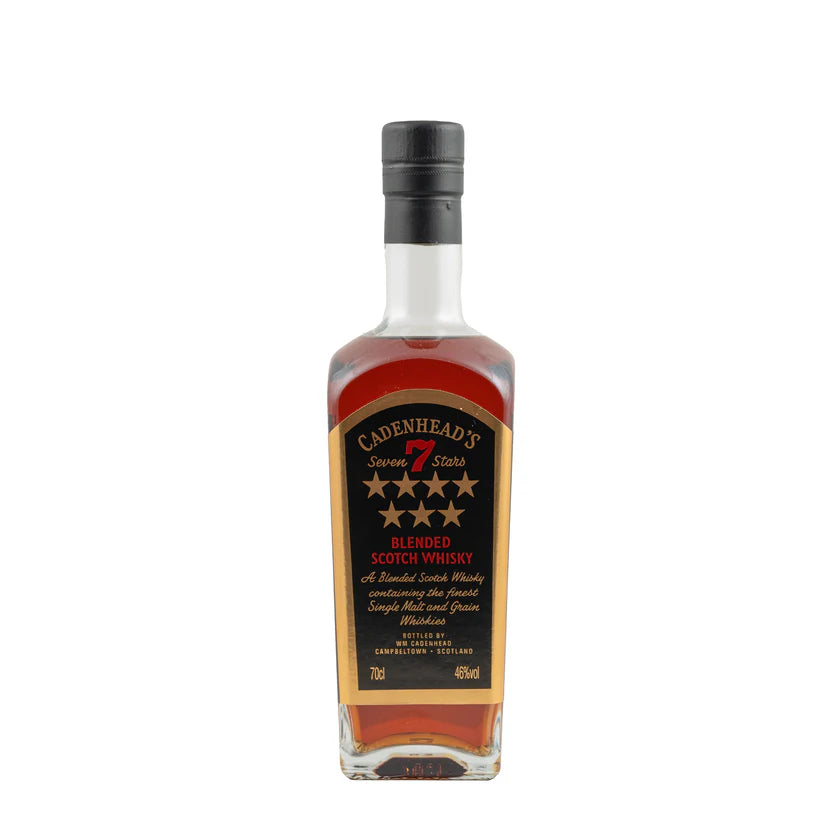 A 700mL bottle of WM Cadenhead’s Seven Stars Blended Scotch Whisky with a black label, gold and red lettering, and a black cap contains rich amber-colored blended Scotch whisky.