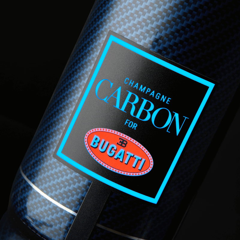 Load image into Gallery viewer, Champagne CARBON Bugatti ƎB.01 | Luminous Edition Limitée Sleeve | Vintage 2002 - Main Street Liquor
