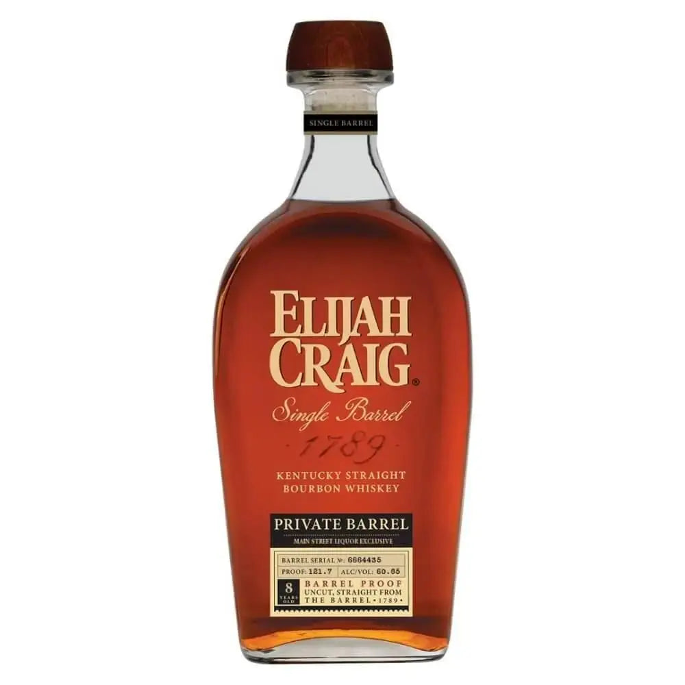 A bottle of Elijah Craig Private Pick Land Of The Free Edition Bourbon, featuring amber liquid in a clear glass bottle with gold and white labeling.