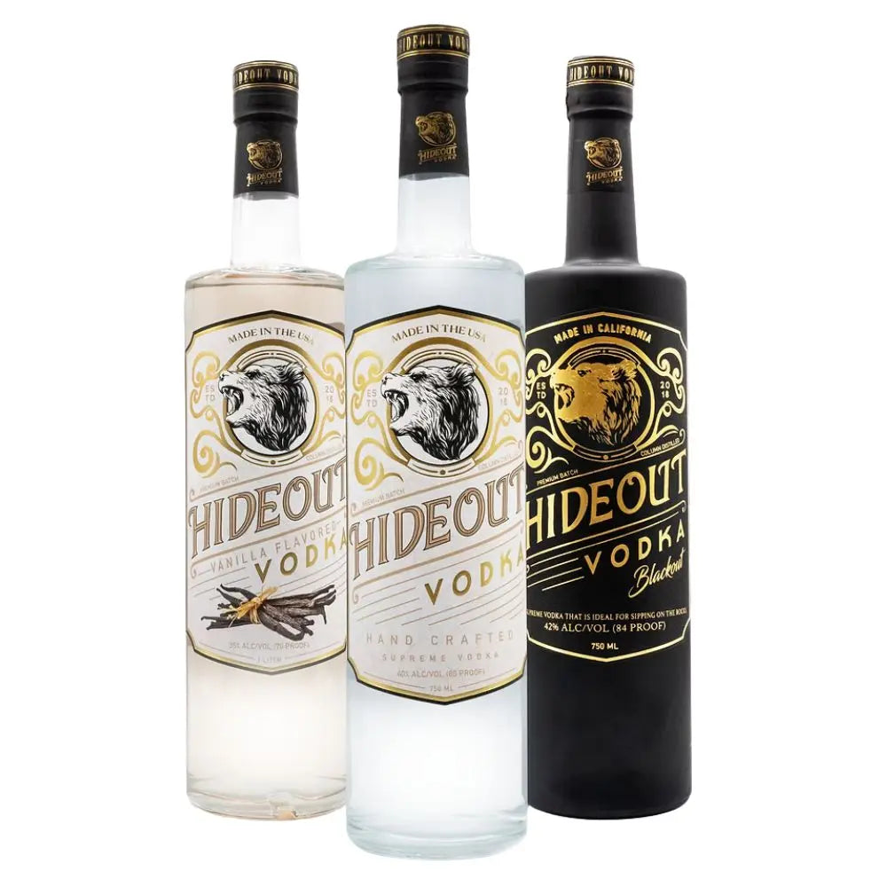 Three bottles from the Hideout Vodka Vanilla, Straight, Black Bundle by Hideout Vodka are displayed side by side on a white background. Each bottle—vanilla, straight, and black—features distinctive gold and black bear-themed labels.