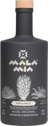 A matte black bottle of Mala Mia Ensamble Mezcal Artesanal features silver agave and geometric designs, a label with artisanal mezcal Oaxaca details in Spanish, and is finished with a wooden cap.