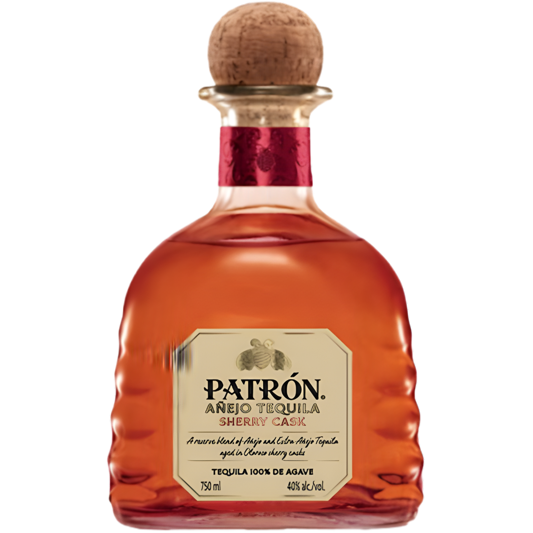 A clear, curvy bottle of Patron Sherry Cask Anejo Tequila features an amber spirit inside, topped with a wooden cork stopper, gold label, and red neck—highlighting Patron's limited-production tequila.