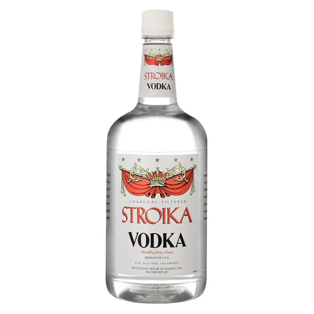 A 1.75L bottle of Stroika Vodka, crafted by Stroika, comes in clear glass with a white and red label adorned with gold accents and a decorative crest, sealed with a white cap. Expertly charcoal filtered, this vodka offers exceptional smoothness and purity.