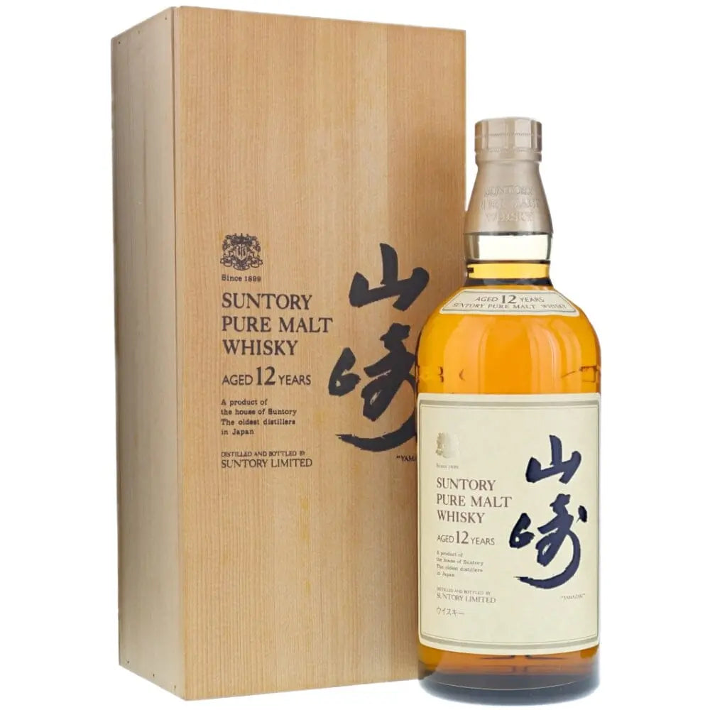 Suntory Yamazaki 12 Year Old whisky bottle with a wooden gift box, showcasing its rich golden color and elegant design.