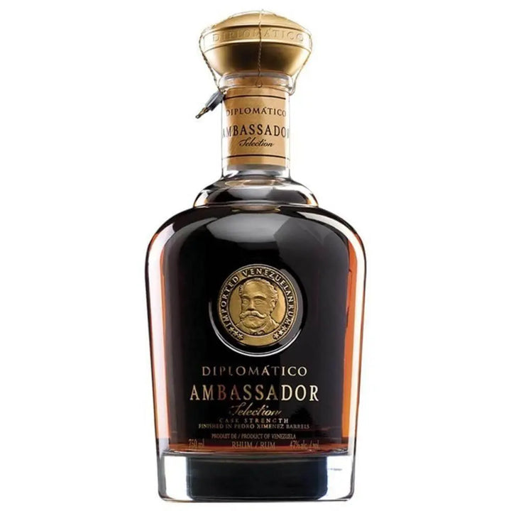 A 750ml bottle of Diplomatico Rum's Ambassador Selection Cask Strength, featuring a gold medallion label, gold-capped top, and filled with rich dark brown rum.