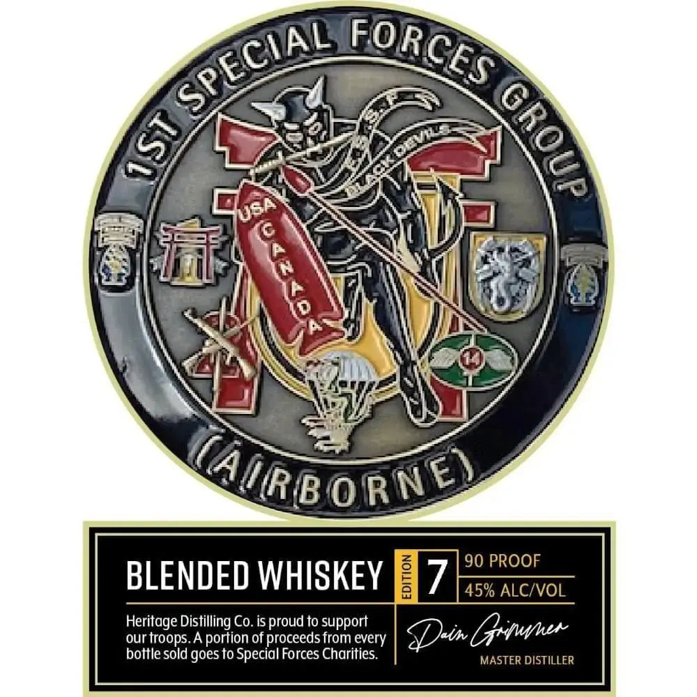 The Heritage Distilling 1st Special Forces Group Whiskey 7th Edition features a commemorative coin honoring the storied heritage of the 1st Special Forces Group (Airborne) and its ties to the First Special Service Force, showcased above a whiskey label indicating 90 proof and 45% alcohol. Proceeds from this Heritage Distilling release support Special Forces charities, and each bottle is signed by a master distiller.